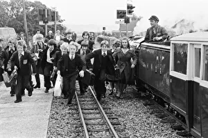 Young schoolchildren make their way to Southlands Primary School on the Romney