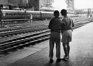 Hobby Prints: Young trainspotters at Paddington Station observing the locomotives. 26th May 1961