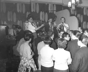 Musicians Prints: Youngsters listening to jazz musician playing at the Studio One Jazz Club. September 195