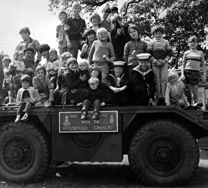 Images Dated 28th July 1973: Some of the youngsters at the St Helens show enjoy a look over an armoured scout car