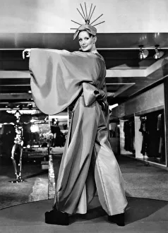 Yukis Japanese influence clearly shows in this emerald green trouser dress being