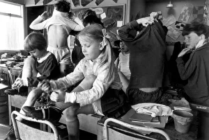 Yvonne Davis preparing herself in the changing room before playing in her school Rugby