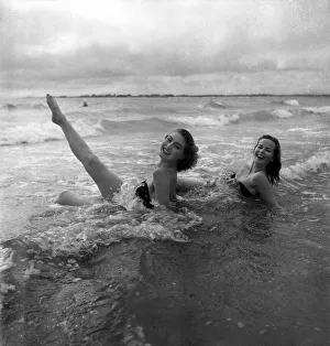 Yvonne Marsh and Ann Hanslip seen here bathing in the sea at West Wittering