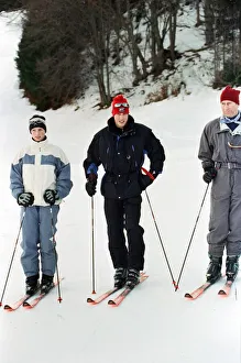 Zara Phillips, Prince William and Prince Charles pose on the ski slopes of Klosters