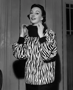 This Zebra striped Giraffe neck sweater and black trousers to be worn with these