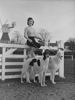 Zene Maishall, film actress, with Barzois dogs Viking and Rena