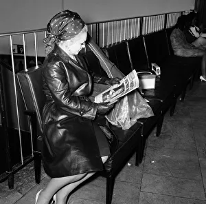 00683 Prints: Zsa Zsa Gabor reads an article in the Daily Mirror regarding a dispute she had in Monte